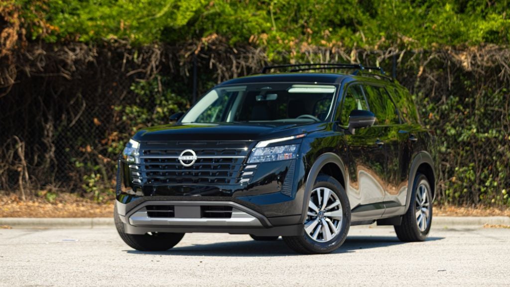2026 Nissan Pathfinder SUV parked with trees in the background