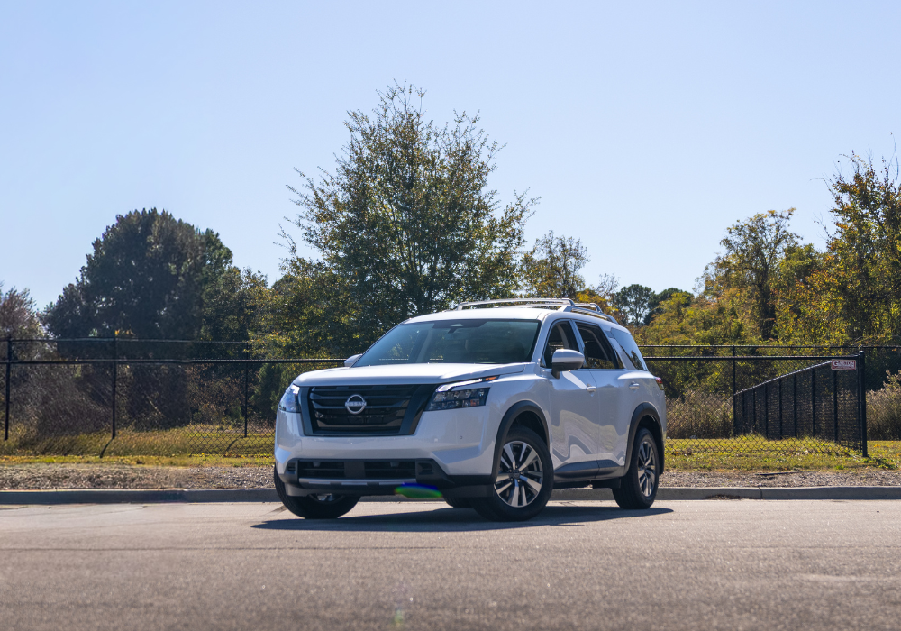 2026 Nissan Pathfinder SUV parked with trees in the background