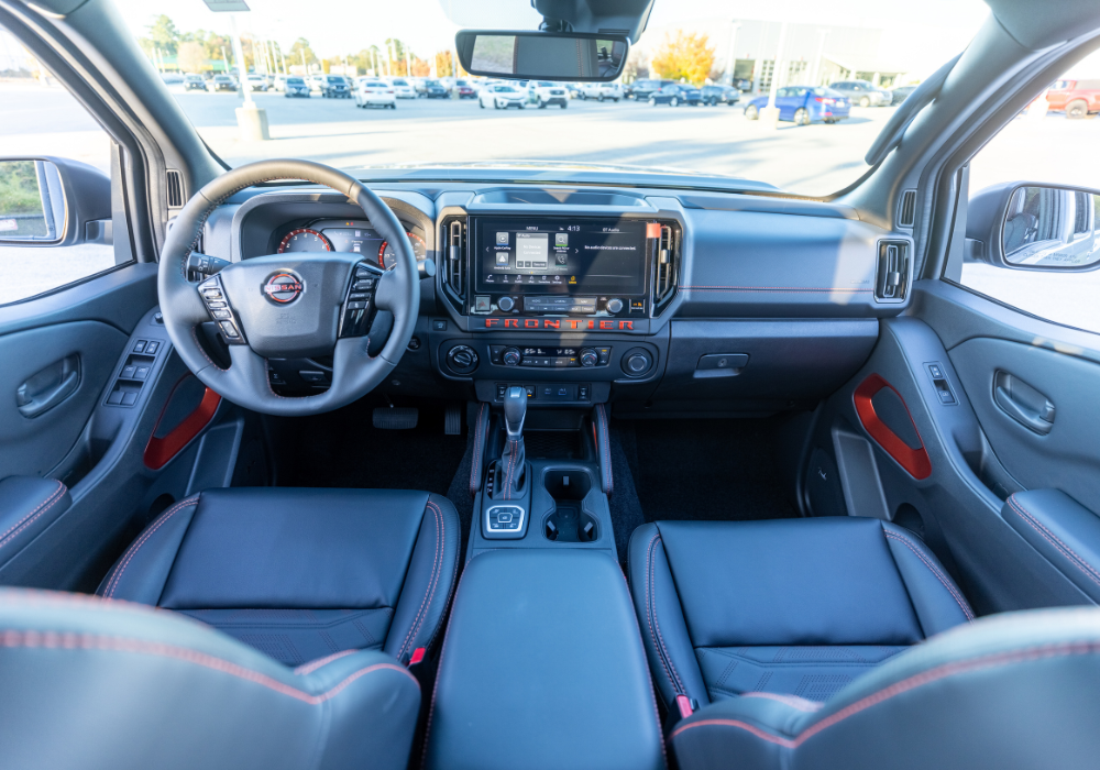 2026 Nissan Frontier interior, including the infotainment system and steering wheel